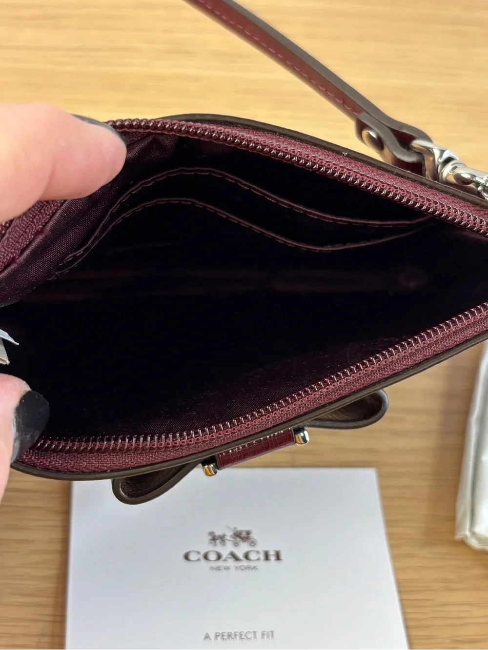 Coach Darcy Patent Leather Bow Small Wristlet in “Sherry” Wine Color NWT
